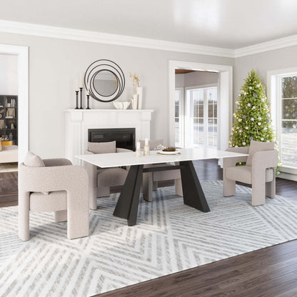 White and Black Sintered Double Pedestal Base Dining Table set in a modern dining room with cozy chairs and festive decor.