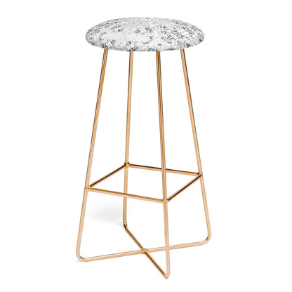 Intricate floral symmetry stool