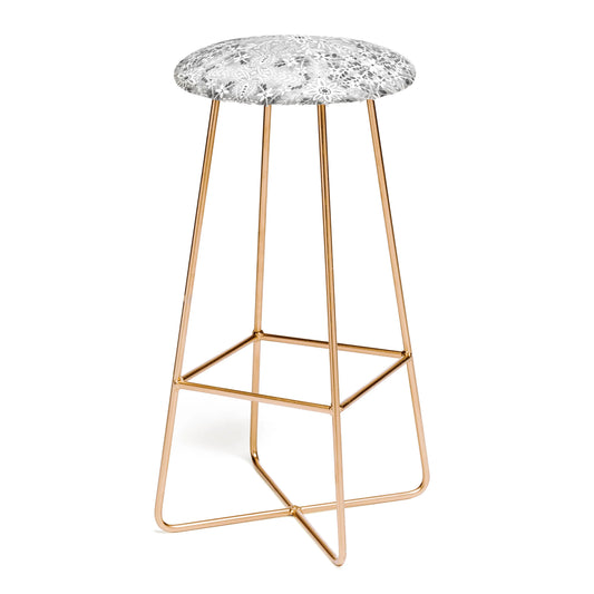 Intricate floral symmetry stool