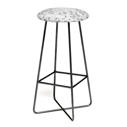 Intricate floral symmetry stool