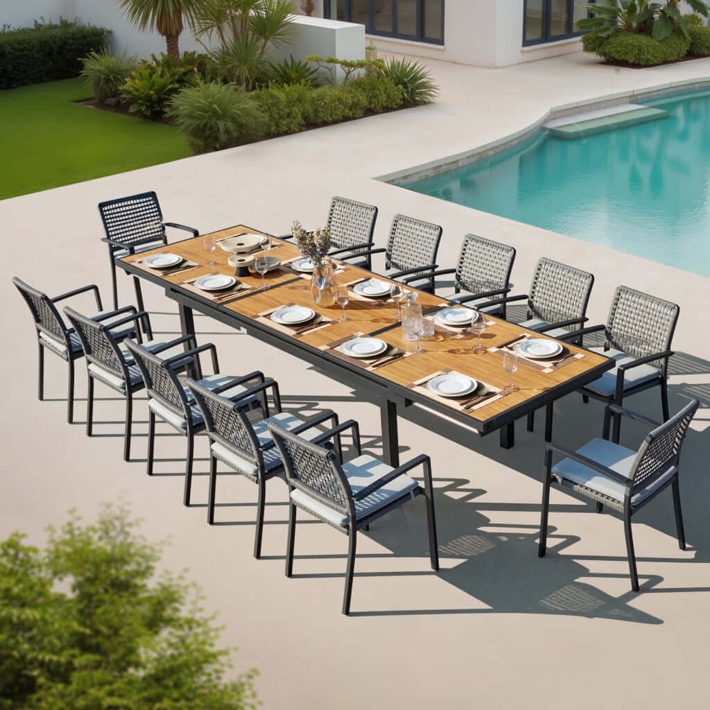 HOMEROOTS 13 Piece Natural and Black Solid Wood Dining Set arranged outdoors near a pool.