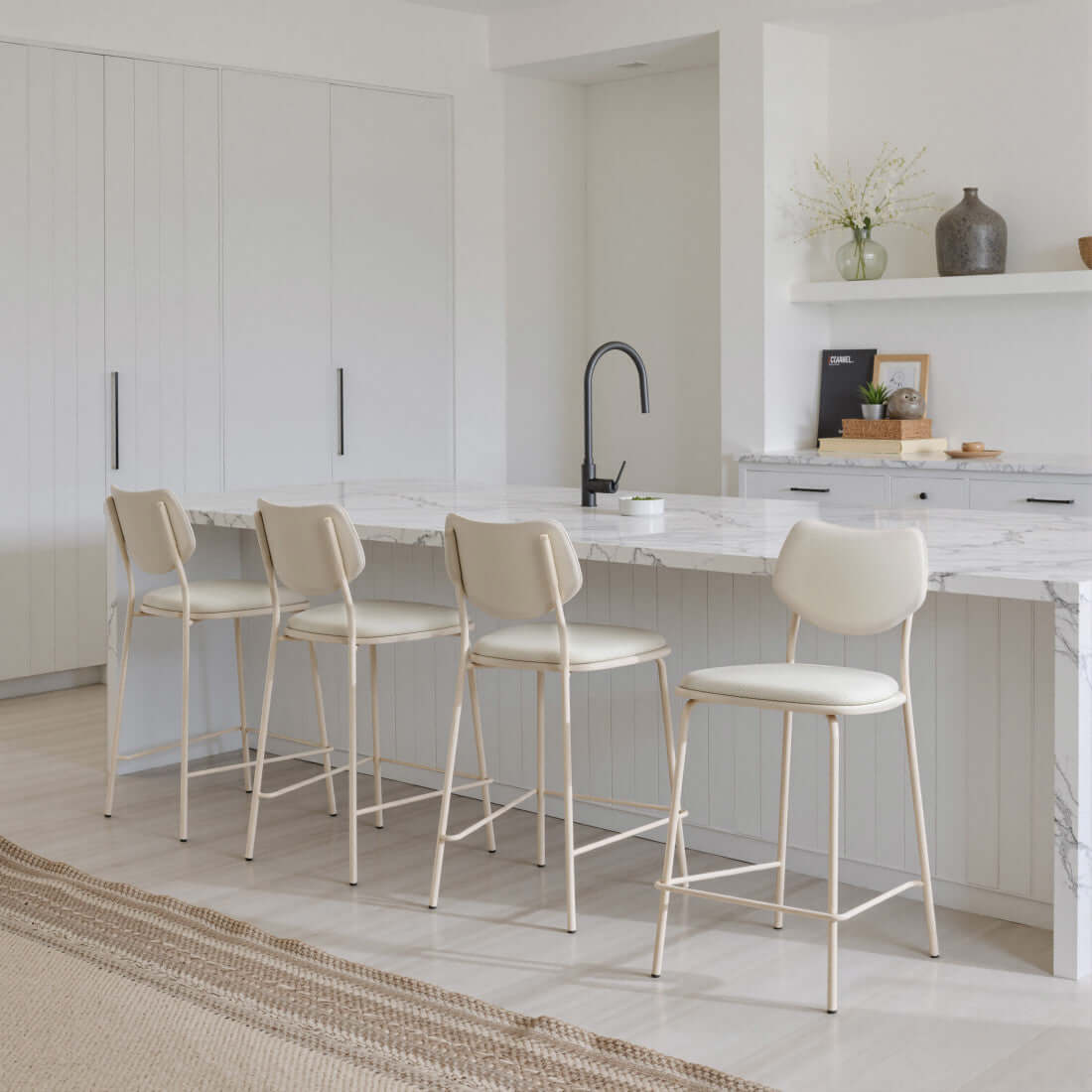 Homeroots 4 Set Gray Bar Chairs Counter Height Steel Frame arranged at a kitchen island.