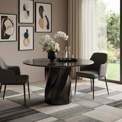 Homeroots Black Marble and Wood Round Top Dining Table surrounded by stylish chairs and modern decor in a bright room.